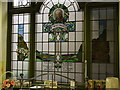 NY2623 : Stained glass in the Co-op by Ian Cardinal