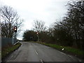 SK5185 : Cramfit Road at the rail bridge by Ian S