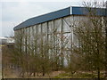 Warehouse by a nature reserve