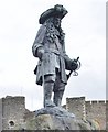 A close up of the William of Orange statue below the walls of Carrickfergus Castle