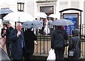 Greeting the newly married couple as they leave the First Carrickfergus Presbyterian Church