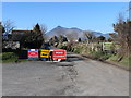 The closed-off section of School Road, Ballymartin from its junction with Ballyveaghbeg Road