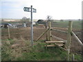 Signpost and stile near Grange Farm