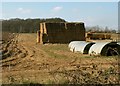 Bales of hay and pig shelters