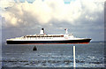 SZ5993 : QE2 outward bound from Southampton on the Solent 1970 by Gordon Spicer
