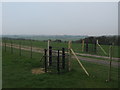 Kissing gates and track to Poison Wood Farm