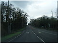 A550 Welsh Road crossed by Shotwick Lane