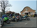 Motorcycles outside a pierside caf