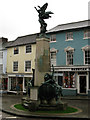 War memorial with shops in Lewes High Street