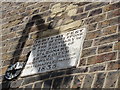 Plaque on a wall in Thoresby Street