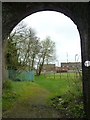 Looking through a railway tunnel towards Peacock Way