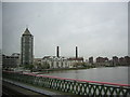 Crossing Battersea railway bridge: view downstream including Chelsea Harbour development