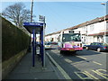 Bus departing from the Copnor Bridge bus stop in New Road