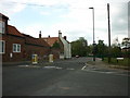 Looking down the B1223 Wistow Road from Monk Lane