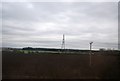 TL1853 : View to  a pylon by the ECML by N Chadwick