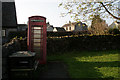 Faded phone box in Foolow