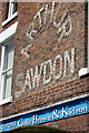 Arthur Sawdon: old painted advert, Whitby