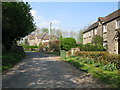 Looking N along road through Chedglow