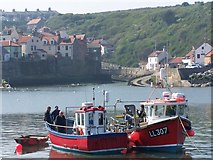 NZ7818 : Fishing boats in Staithes Harbour by David Martin