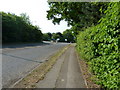 Mini roundabout at the junction of the B2118 and A23 slip road