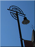 SD5817 : Ornamental lamp post outside St Laurence's gates by John S Turner