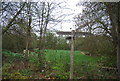 Footpath sign at Brewhurst Lock