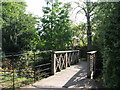 Footbridge over the Quaggy River in Manor House Gardens