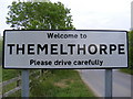 TG0524 : Themelthorpe Village name sign by Geographer