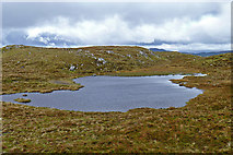 NG4540 : Lochan close to the summit of Skriaig by John Allan