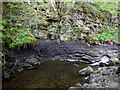 Crag on bend of Middleton Burn