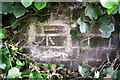 Benchmark on wall on south side of Grand Union Canal