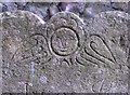 Cheery tombstone angel at Winfrith Newburgh