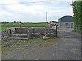 M2272 : Farm buildings and old pump at Togher by Oliver Dixon