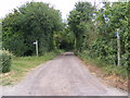 TM2855 : Footpath to the B1078 & entrance to Thorpe Hall Farm by Geographer