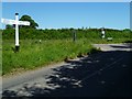 Signpost at junction of Treemans Road and Monteswood Lane