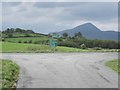 L9875 : Road junction with the N59 - Croag Patrick in the distance by Keith Salvesen