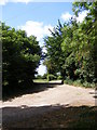 Footpath to Shrublands Farm & entrance to White House & Hill Top Farm