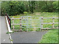 Padlocked kissing gate blocking entry to a riverside track, Pontnewynydd