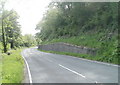 Sloping NE side of a wall alongside Crumlin Road