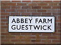 TG0527 : Abbey Farm,  name sign by Geographer