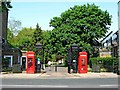 TQ2677 : Two red telephone kiosks at entrance to Brompton Cemetery, Fulham Road, London SW10 by L S Wilson