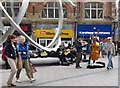 A Busker Band playing at "The Spirit of Belfast" sculpture in Arthur Square