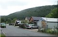 Lockup garages and wooded hillside, Plasycoed, Pontypool