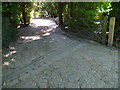 Miniature railway line crosses drive near Forest Farm