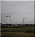 NZ2478 : Wind turbines, Nelson Industrial Estate by N Chadwick