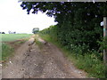 TM2765 : Footpath to the A1120 Button's Hill by Geographer