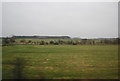 NU1925 : View across to Brunton Airfield by N Chadwick