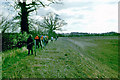 Walkers skirt the old gravel pit, 1982