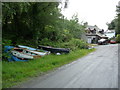 Cottage and boats beside the path near Penmaenpool