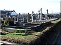 J3416 : The graveyard at St Joseph's Catholic Chapel, Ballymartin by Eric Jones